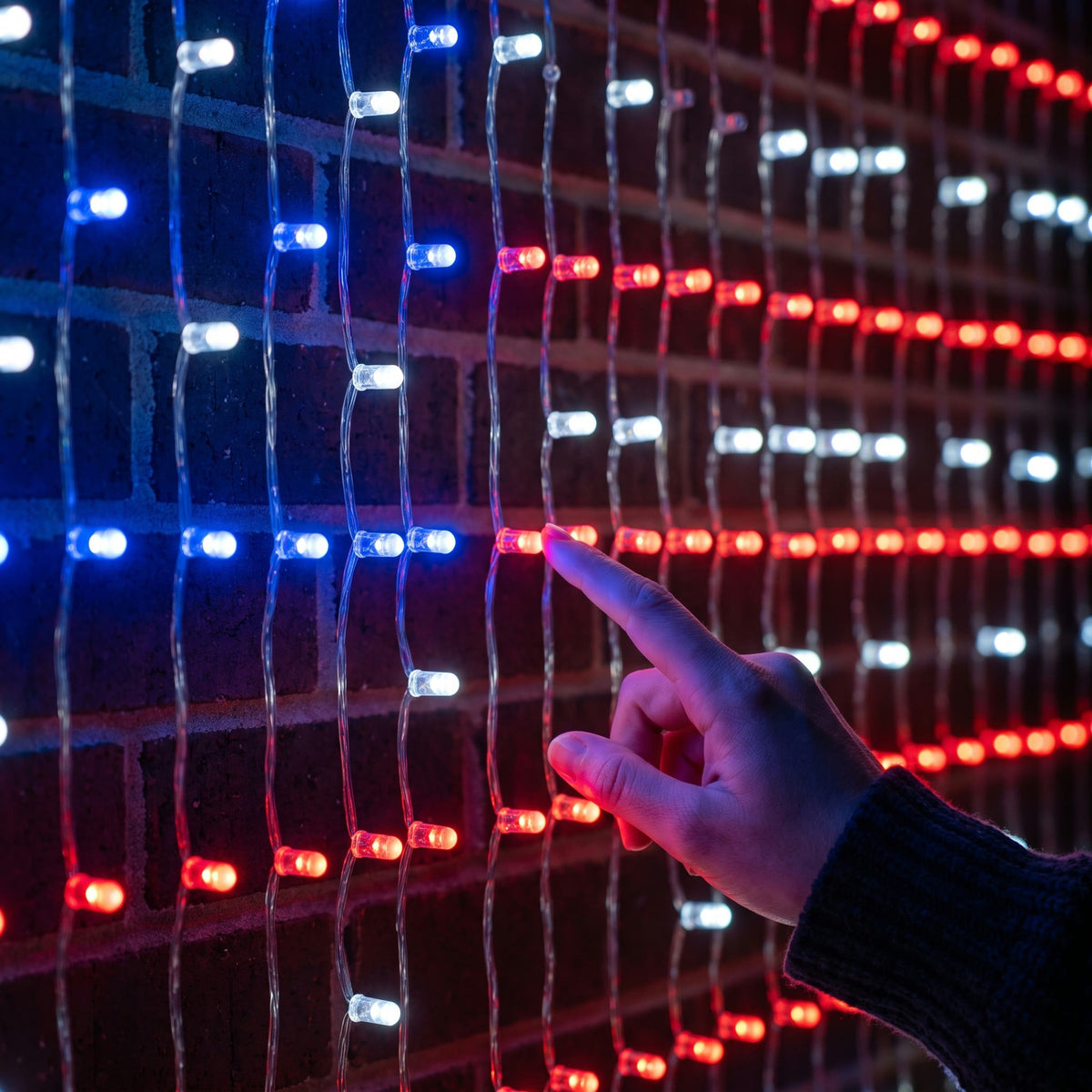 Close-up of the LED pixel grid on clear wire